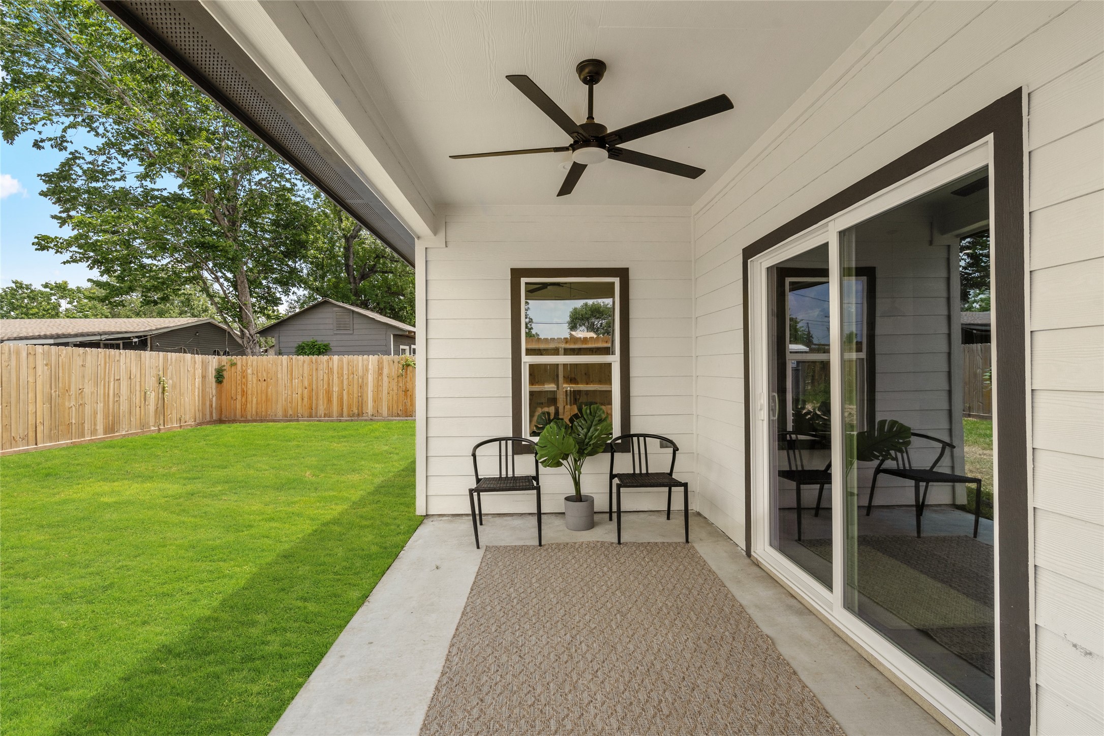 14307 Laredo Street Houston, TX 77015 - Photo 35 of 38 a view of a porch with chairs and backyard