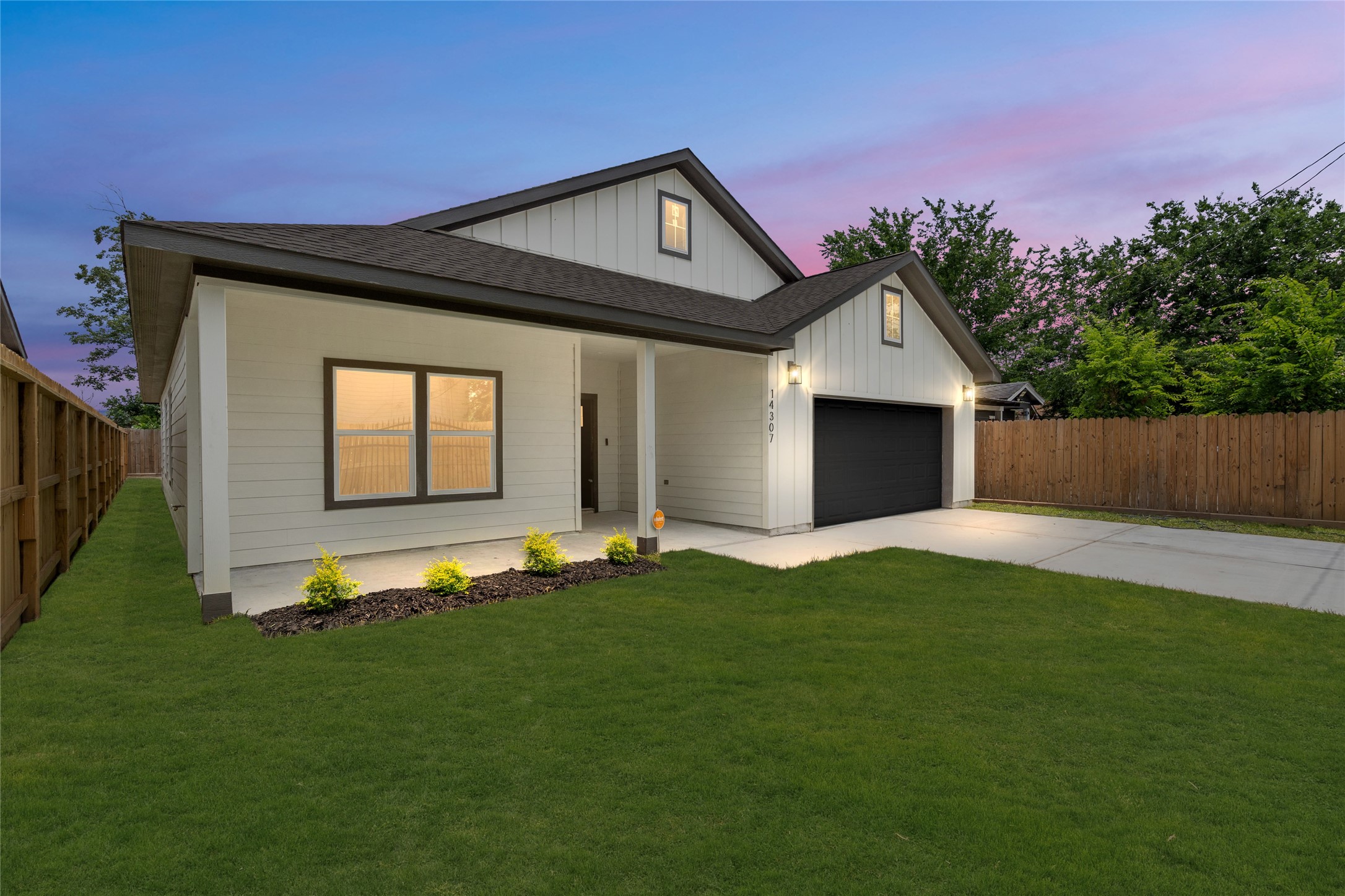 14307 Laredo Street Houston, TX 77015 - Photo 8 of 38 a front view of a house with a yard
