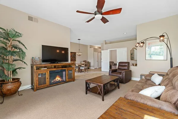 a view of a dining room with furniture