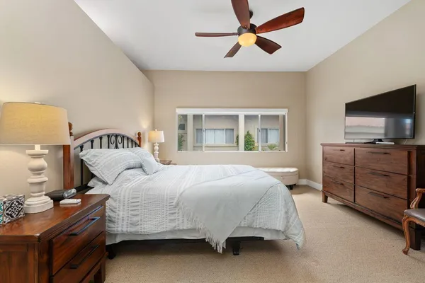 a view of a patio with a table and chairs