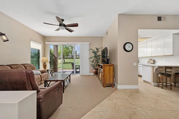 a living room with furniture and a window