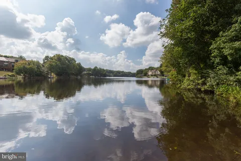 a view of a pathway both side of yard