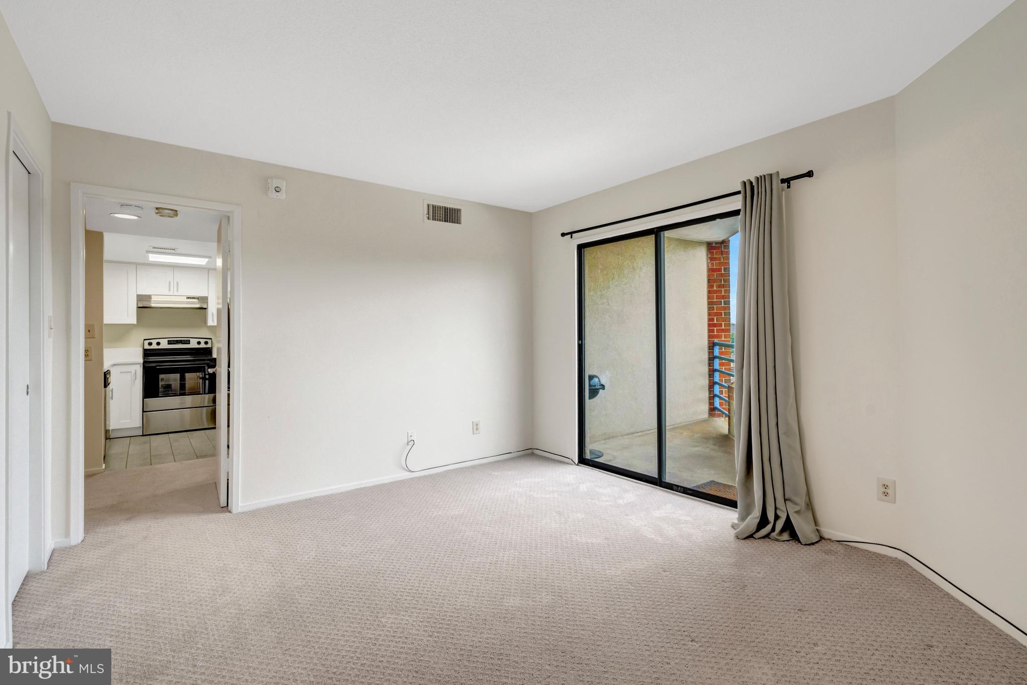 1951 Sagewood Lane, Unit 619 Reston, VA 20191 - Photo 10 of 33 Primary Bedroom w/ Balcony