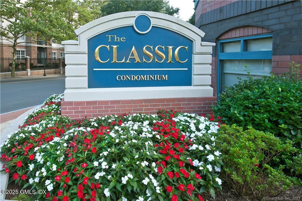 25 Forest Street, Unit 11M Stamford, CT 06901 - Photo 14 of 21 a sign that is in front of flowers