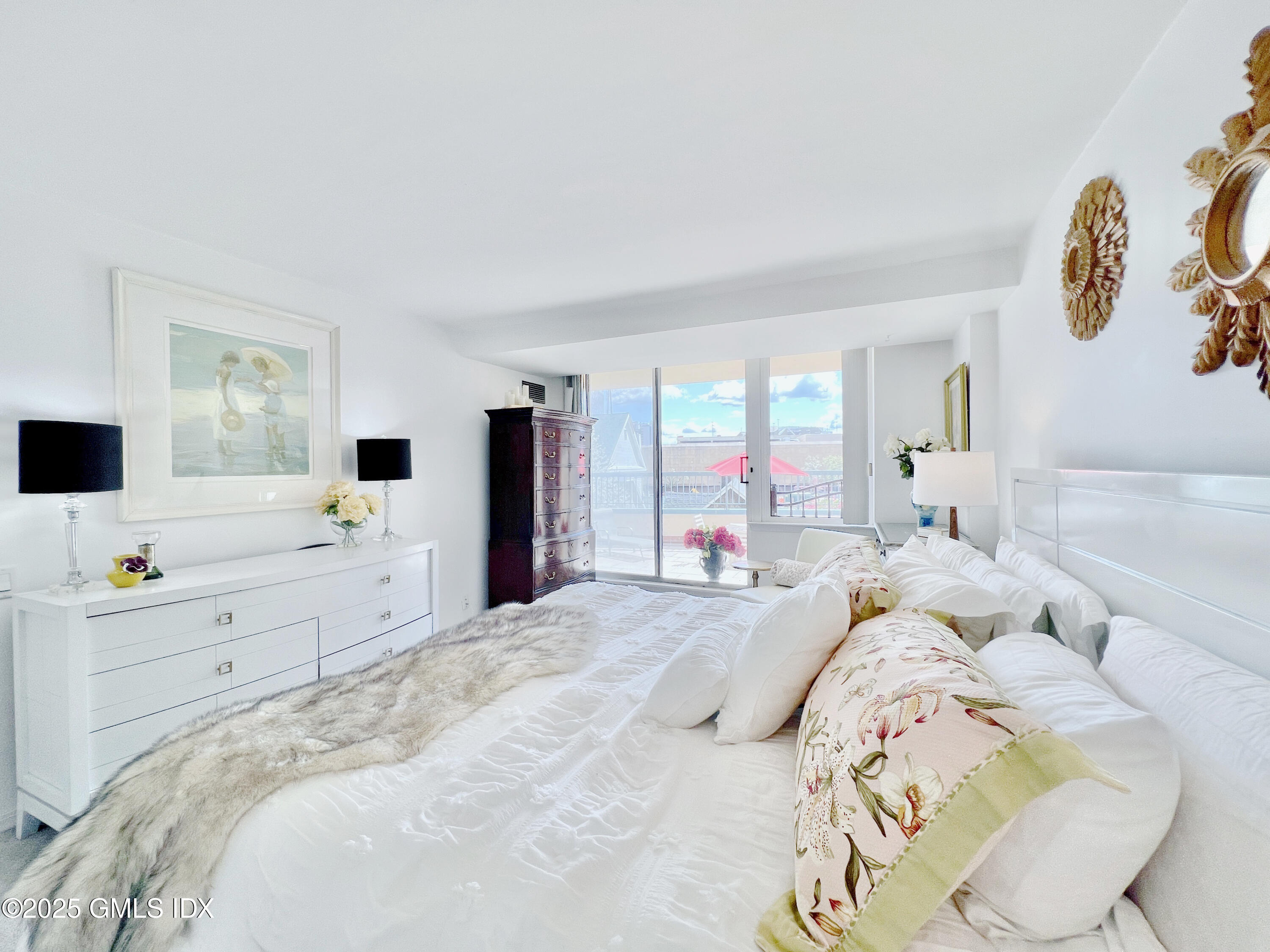 25 Forest Street, Unit 11M Stamford, CT 06901 - Photo 10 of 21 a bedroom with a bed and a flat screen tv