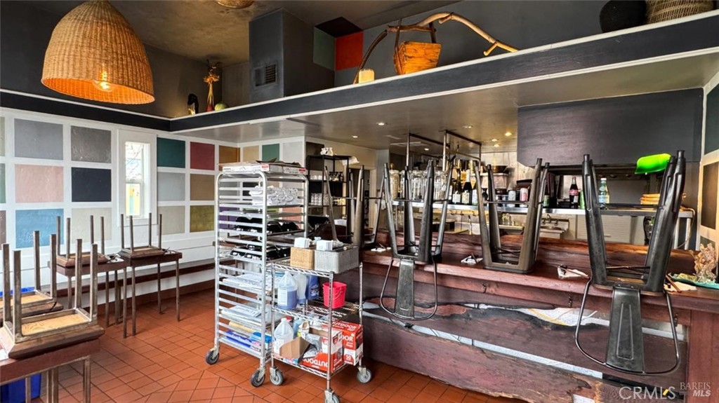 35 East Commercial Street Willits, CA 95490 - Photo 2 of 19 a gym room with lots of gym equipment