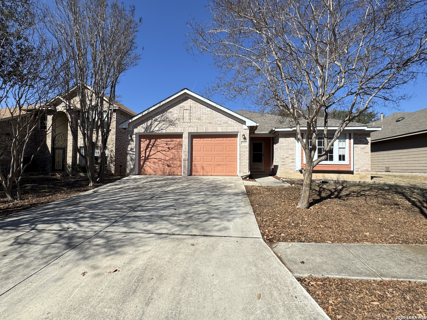 8363 Copperglen Converse, TX 78109 - Photo 1 of 1 a front view of a house with a yard and garage