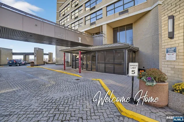 a room with a large mirror and glass door