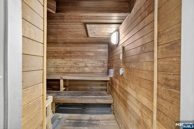 a view of a swimming pool with an outdoor space and seating area