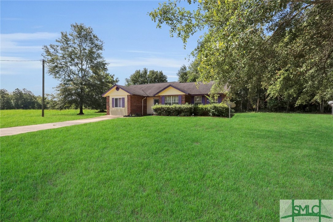 2628 John Wells Road Hinesville, GA 31313 - Photo 1 of 18 Grass has been digitially enhanced for the purpose