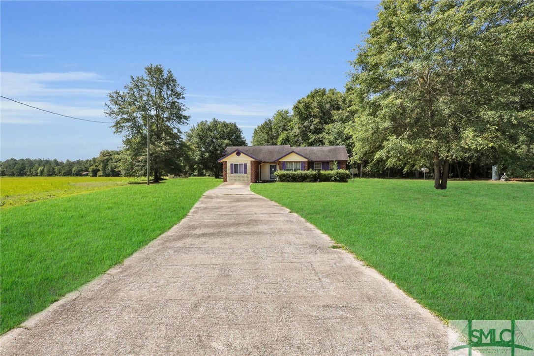 2628 John Wells Road Hinesville, GA 31313 - Photo 2 of 18 Grass has been digitially enhanced for the purpose