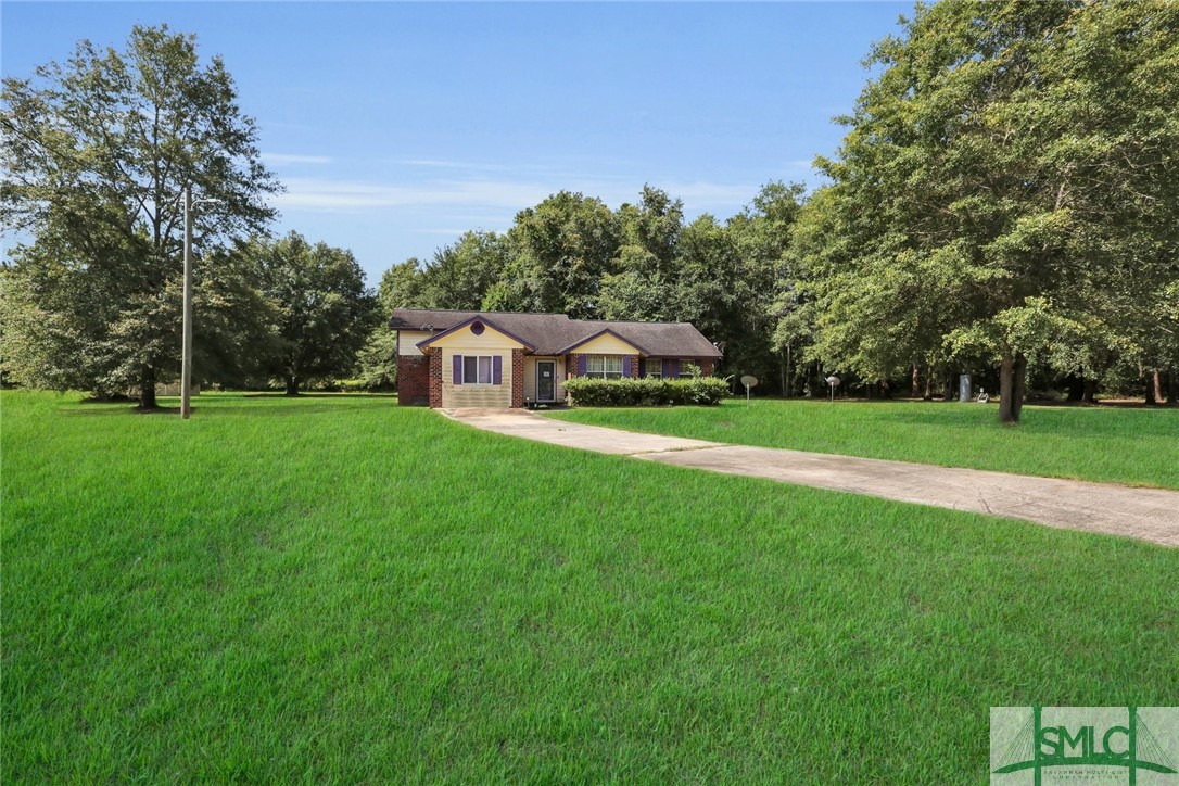 2628 John Wells Road Hinesville, GA 31313 - Photo 3 of 18 Grass has been digitially enhanced for the purpose