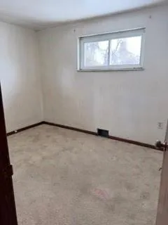 an empty room with a window