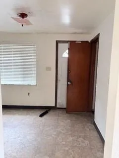 an empty room with a window