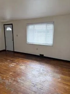 an empty room with a window