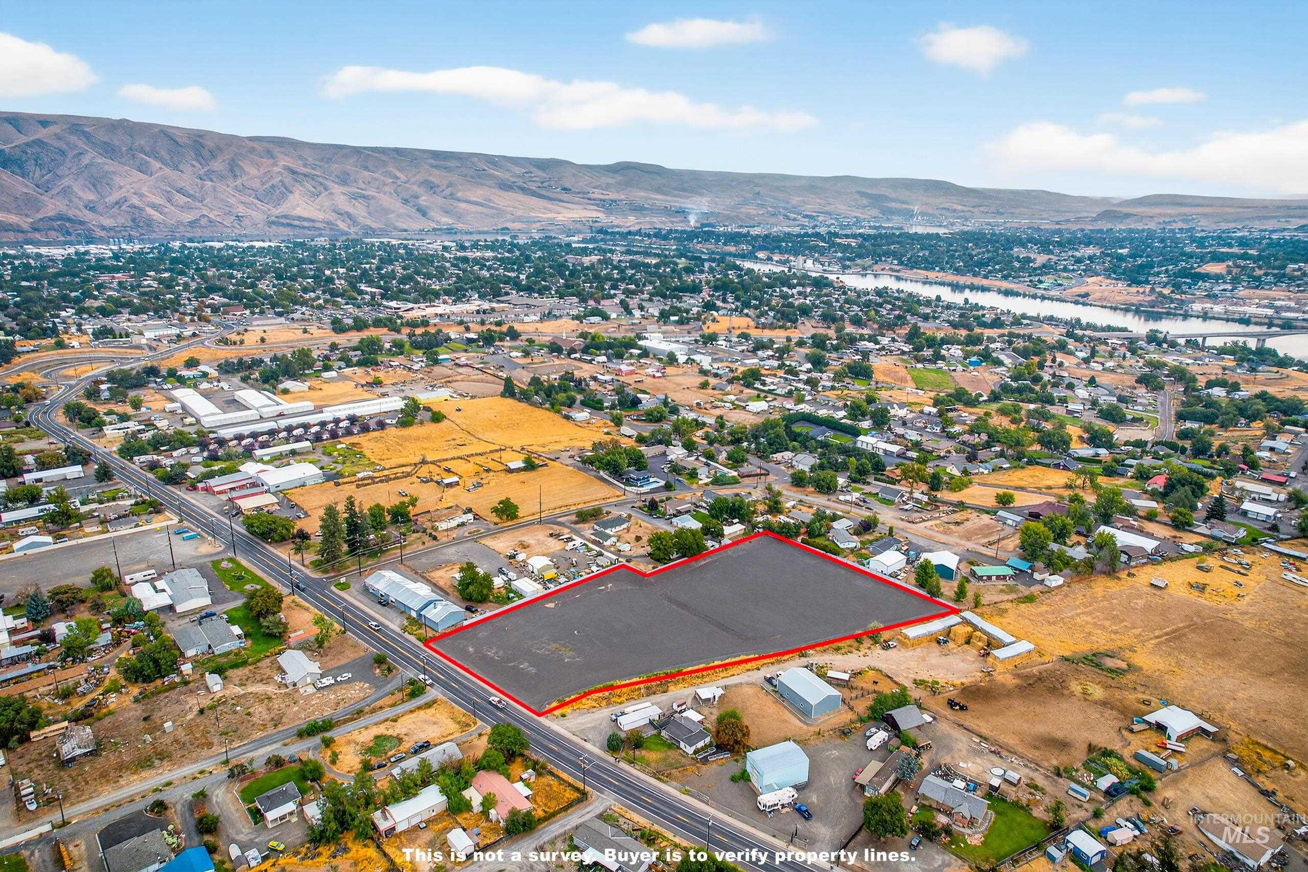 Nna 13th Street Clarkston, WA 99403 - Photo 3 of 27 Aerial view of property's location featuring property parcel outlined and a water and mountain view