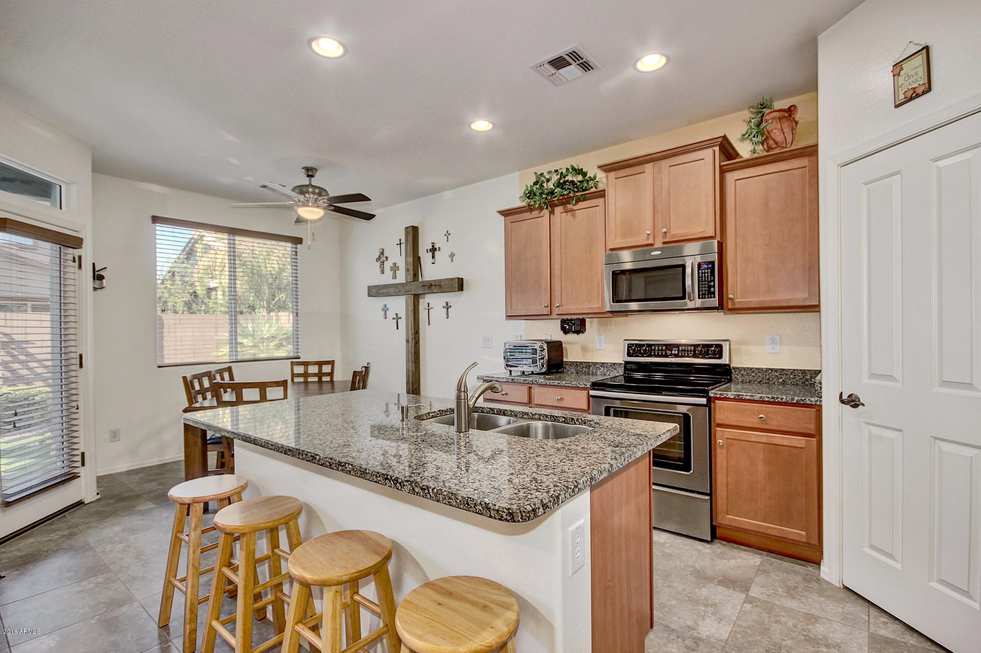 3344 East Morrison Ranch Parkway Gilbert, AZ 85296 - Photo 9 of 38 Kitchen with Breakfast Bar