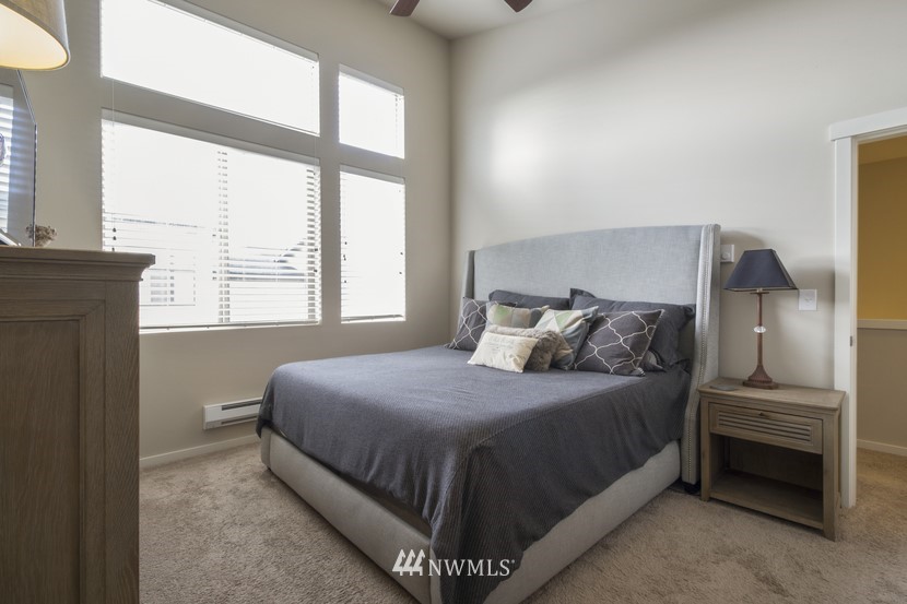 4520 Northeast 3rd Lane Renton, WA 98059 - Photo 11 of 20 a bedroom with a bed and a window