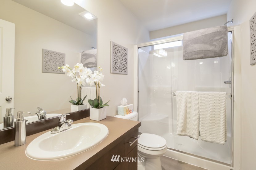 4520 Northeast 3rd Lane Renton, WA 98059 - Photo 17 of 20 a bathroom with a sink toilet and shower
