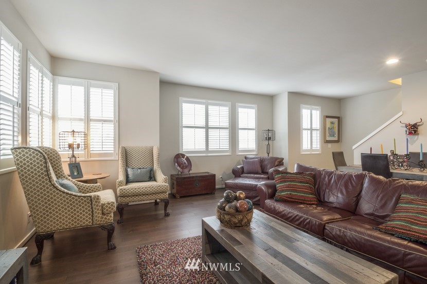4520 Northeast 3rd Lane Renton, WA 98059 - Photo 5 of 20 a living room with furniture wooden floor and a large window