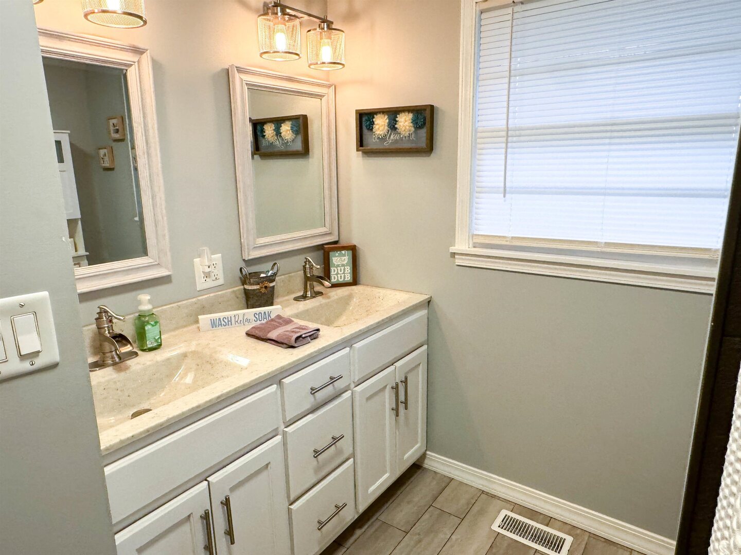 300 Williford Road Jonesboro, IL 62952 - Photo 25 of 34 Bathroom with double vanity and baseboards