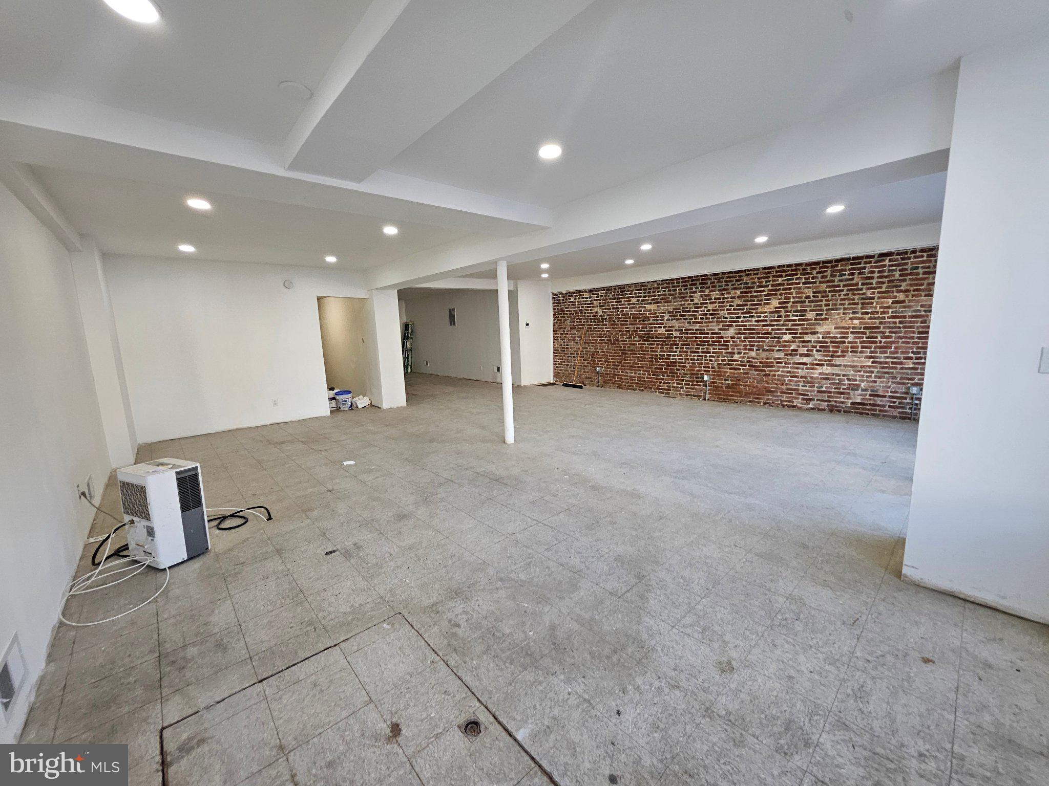322 Ridge Avenue Allentown, PA 18102 - Photo 3 of 5 Spacious, modern loft with brick accents.