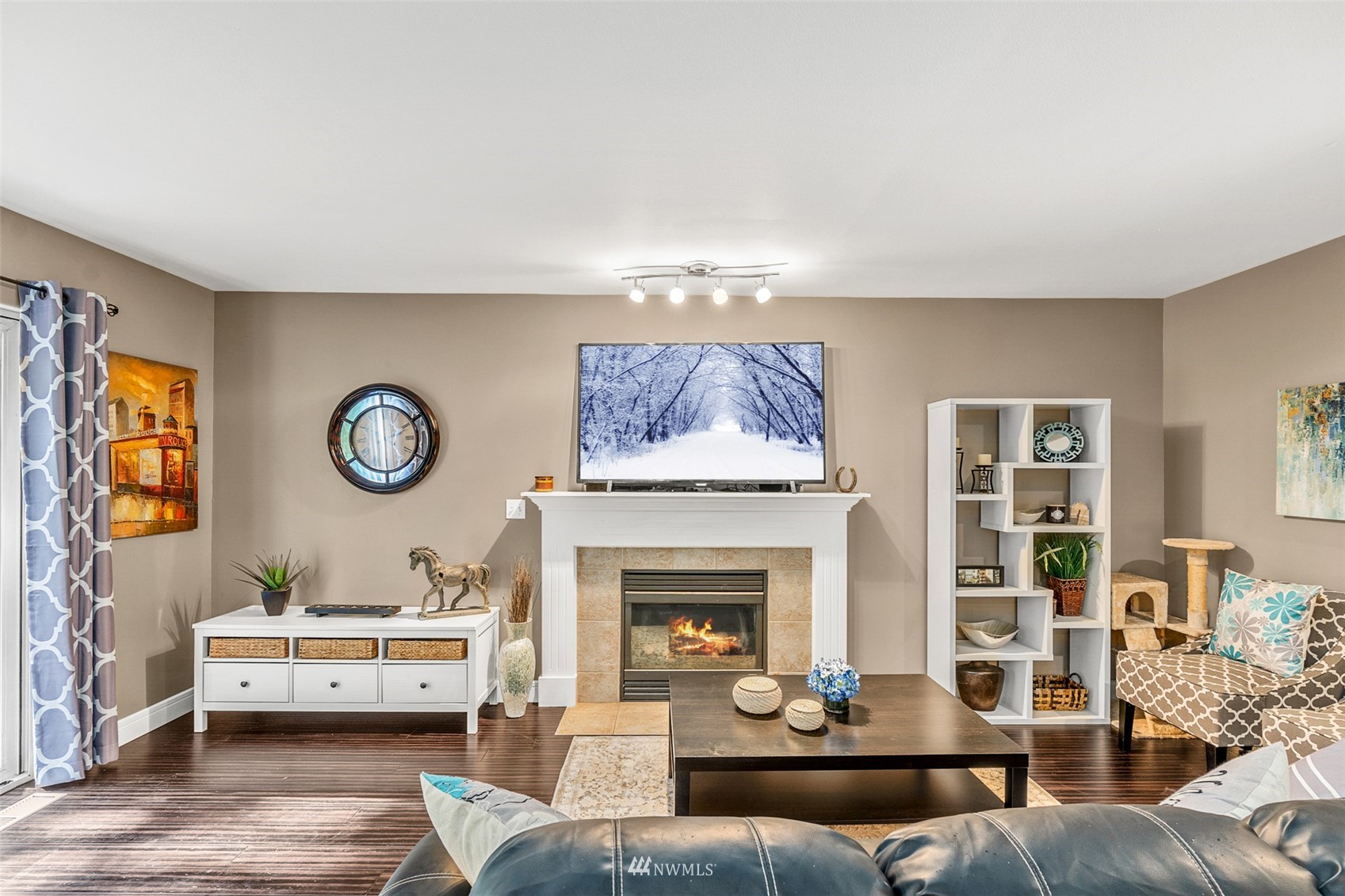 23009 21st Avenue Southeast Bothell, WA 98021 - Photo 14 of 40 a living room with furniture and a fireplace