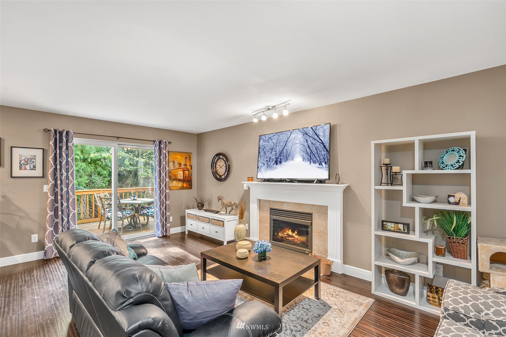 23009 21st Avenue Southeast Bothell, WA 98021 - Photo 15 of 40 a living room with furniture and a fireplace
