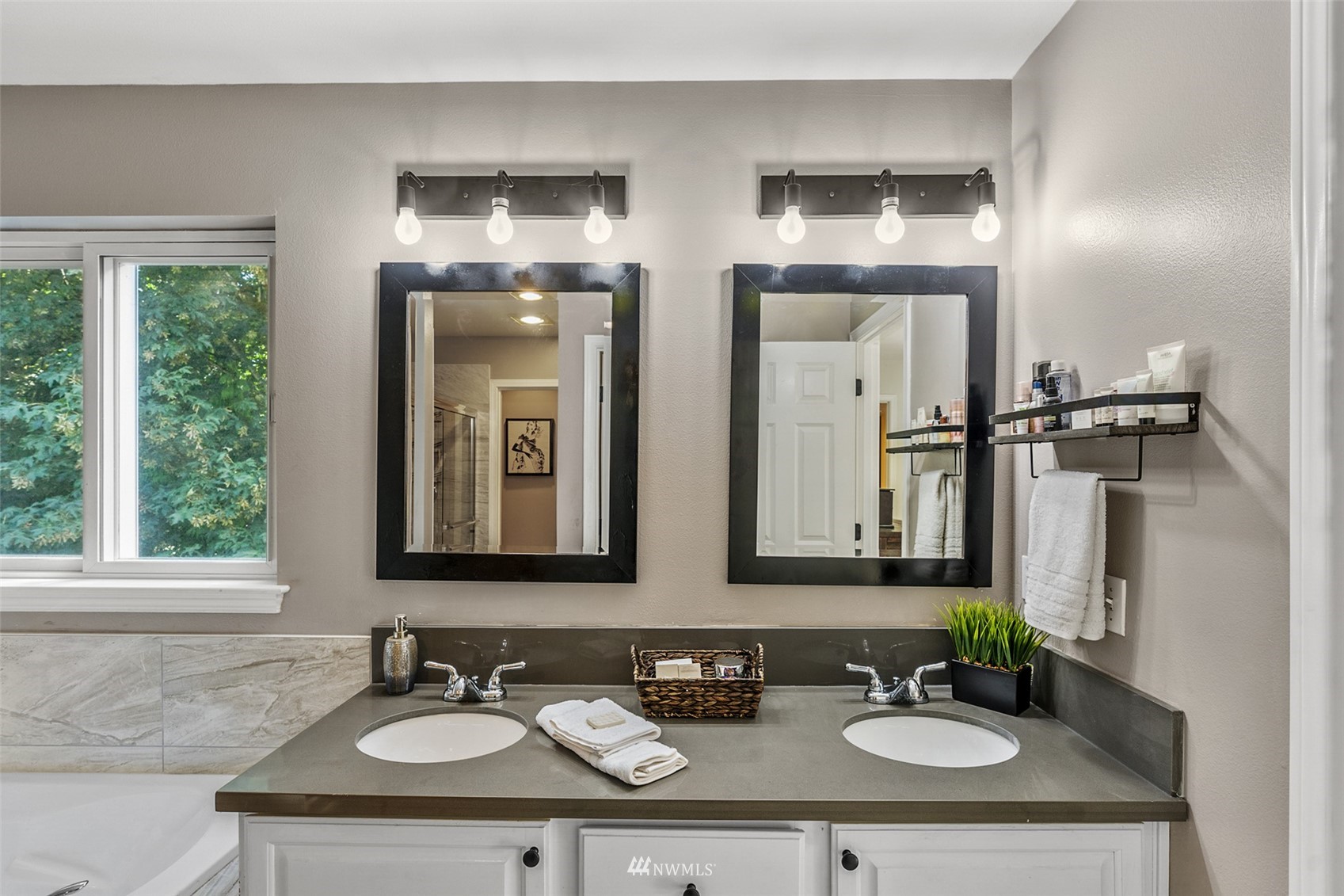 23009 21st Avenue Southeast Bothell, WA 98021 - Photo 21 of 40 a bathroom with double vanity sinks and a mirror