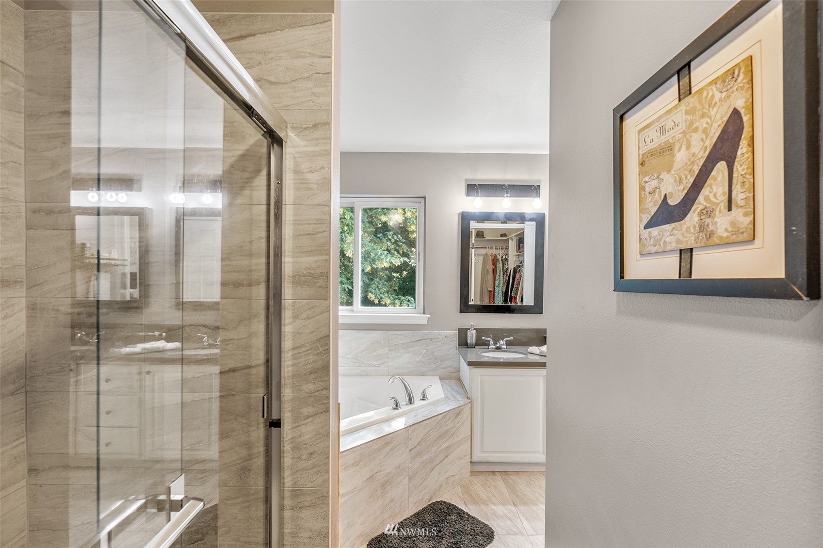 23009 21st Avenue Southeast Bothell, WA 98021 - Photo 22 of 40 a bathroom with a bathtub and shower