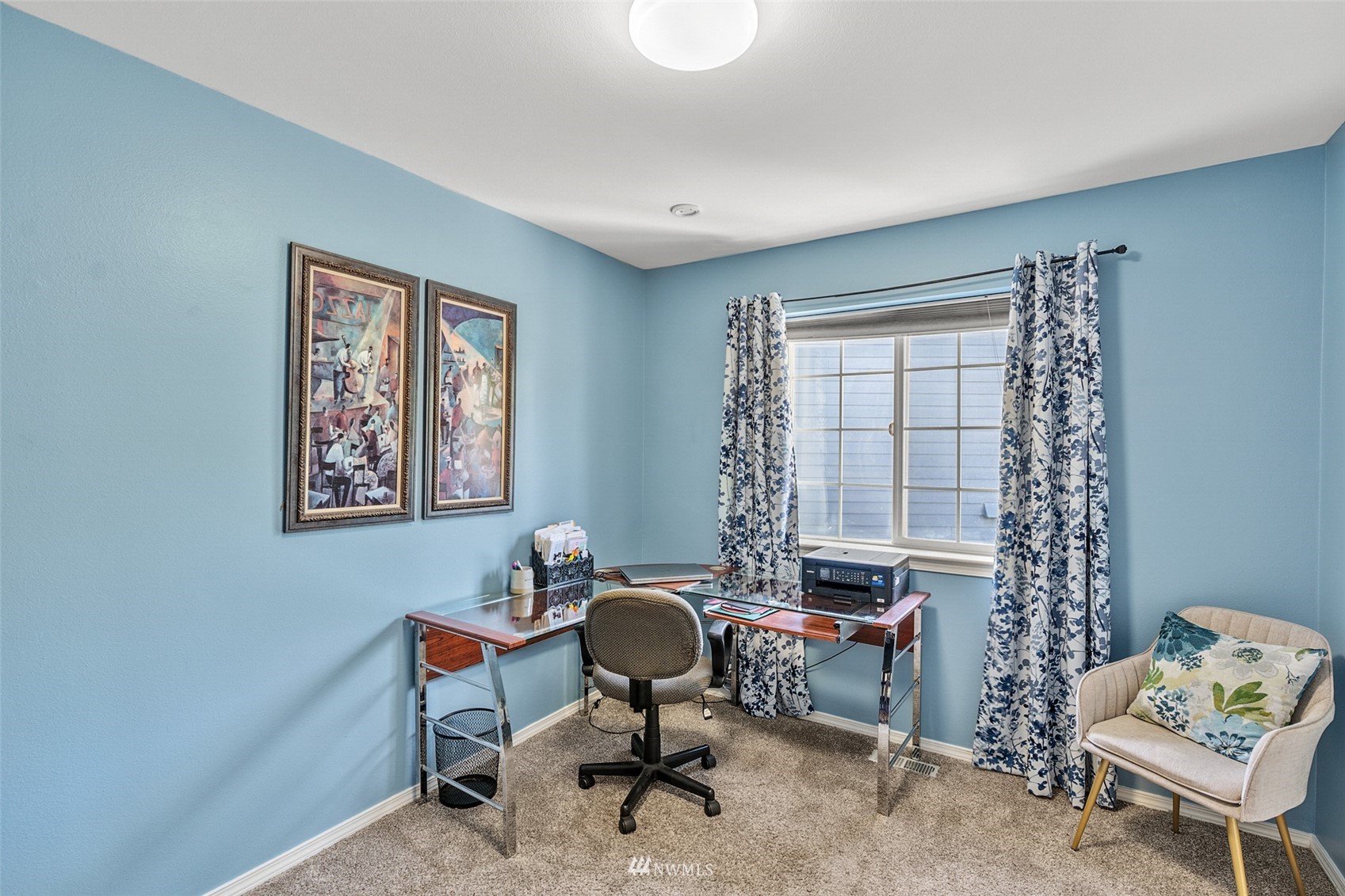 23009 21st Avenue Southeast Bothell, WA 98021 - Photo 25 of 40 a view of a workspace with furniture and a window