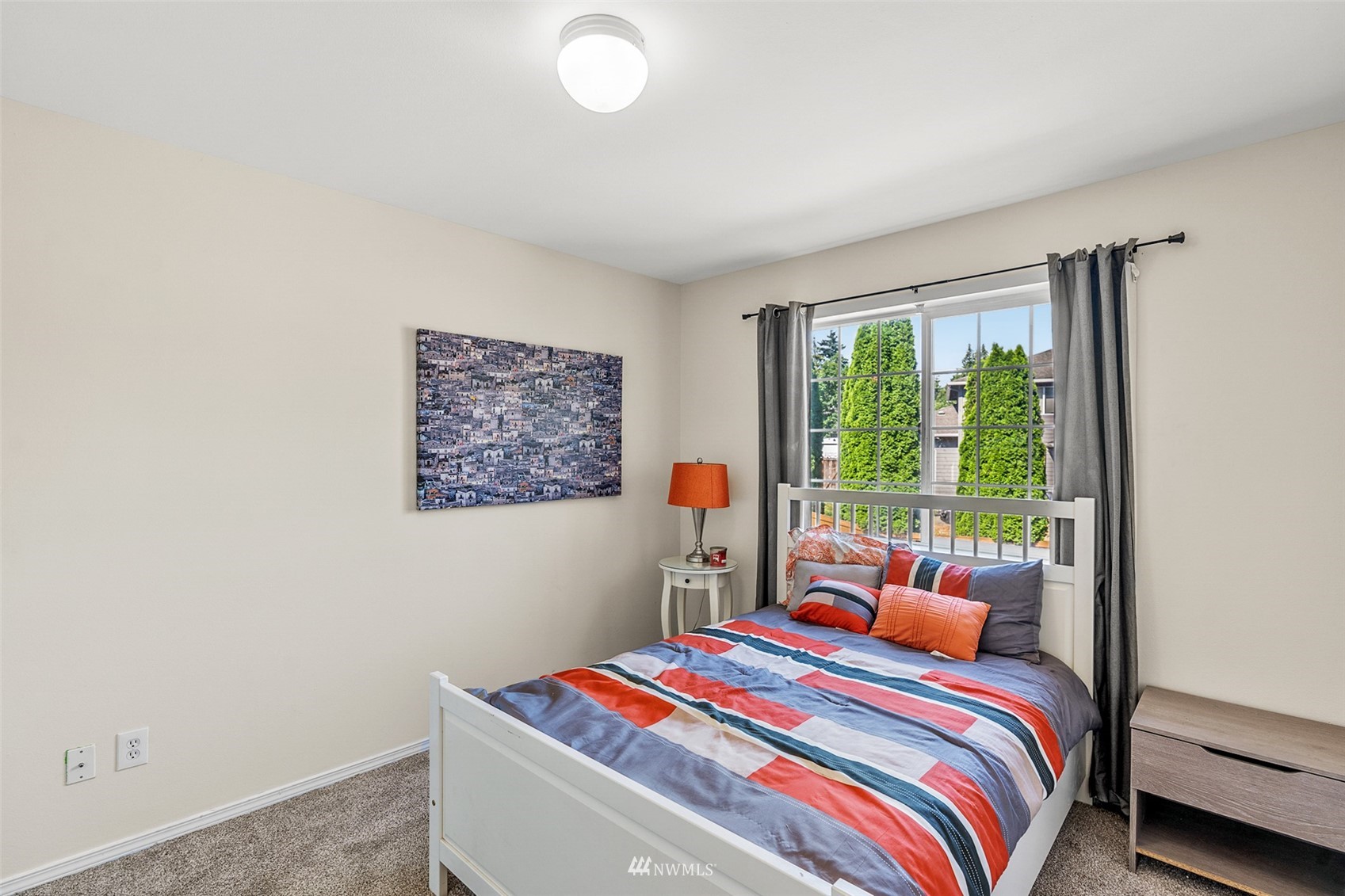 23009 21st Avenue Southeast Bothell, WA 98021 - Photo 28 of 40 a bedroom with a bed and a window