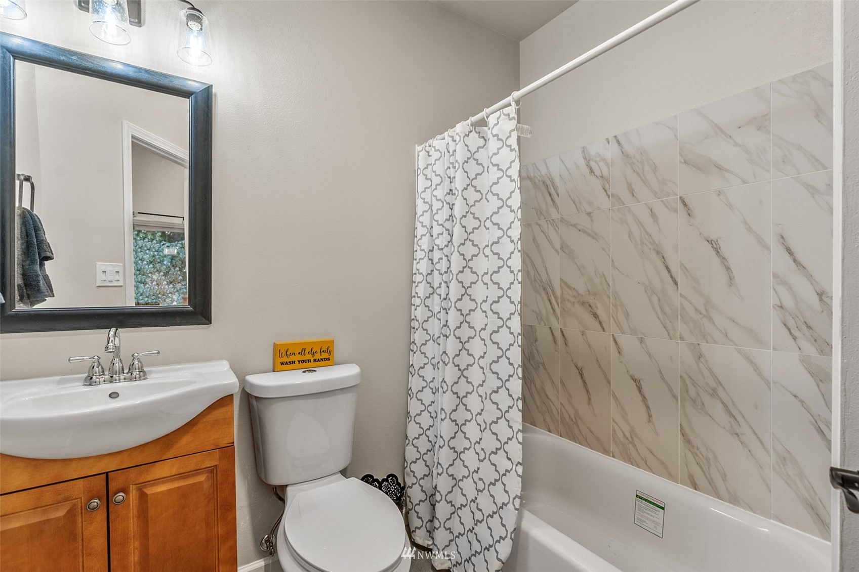 23009 21st Avenue Southeast Bothell, WA 98021 - Photo 33 of 40 a bathroom with a sink toilet and shower