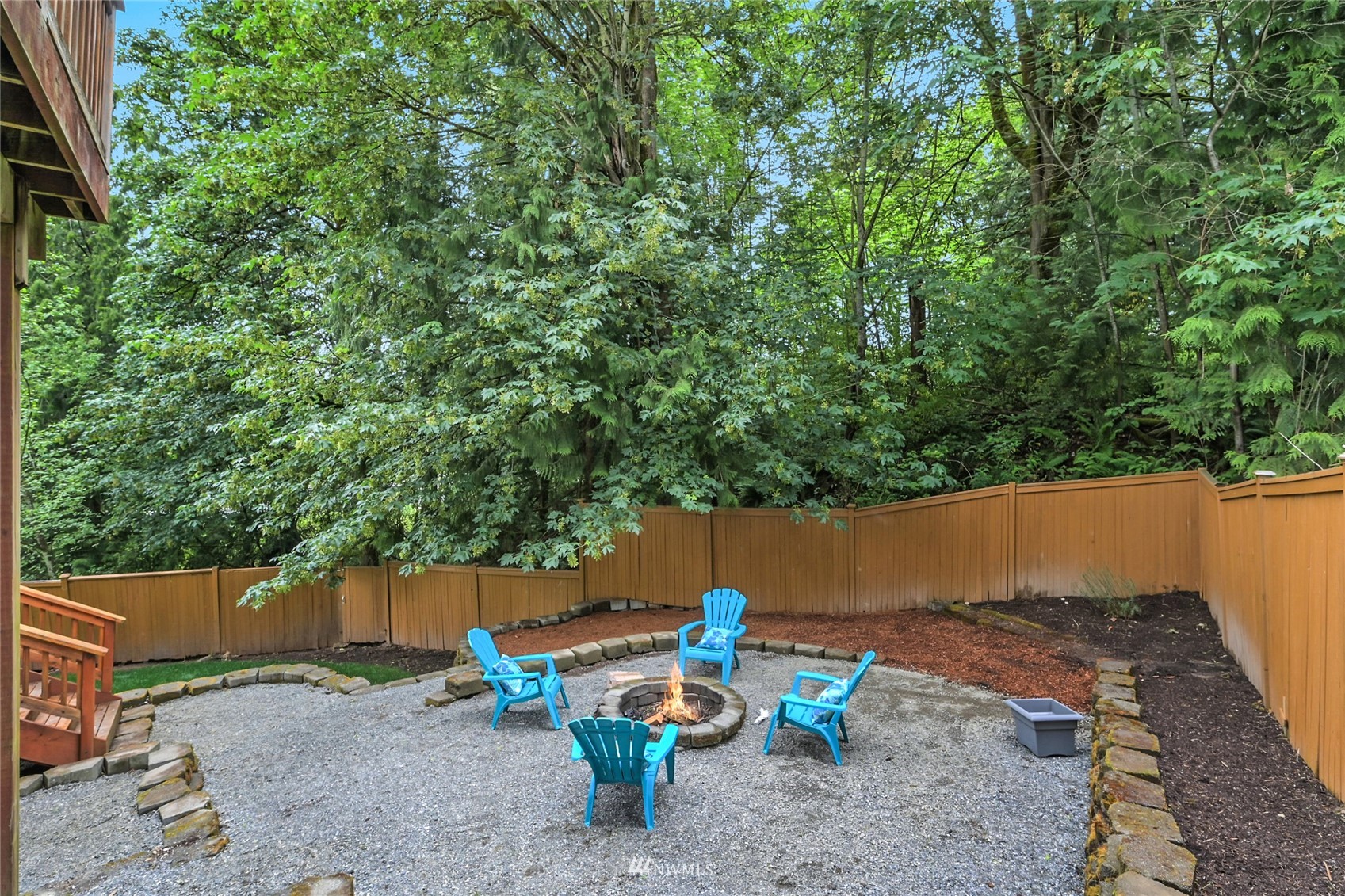 23009 21st Avenue Southeast Bothell, WA 98021 - Photo 36 of 40 a backyard of a house with table and chairs