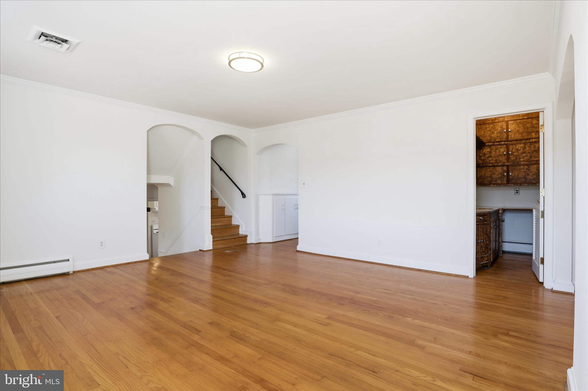 3701 Pine Brook Road Alexandria, VA 22310 - Photo 16 of 78 a view of an empty room with wooden floor