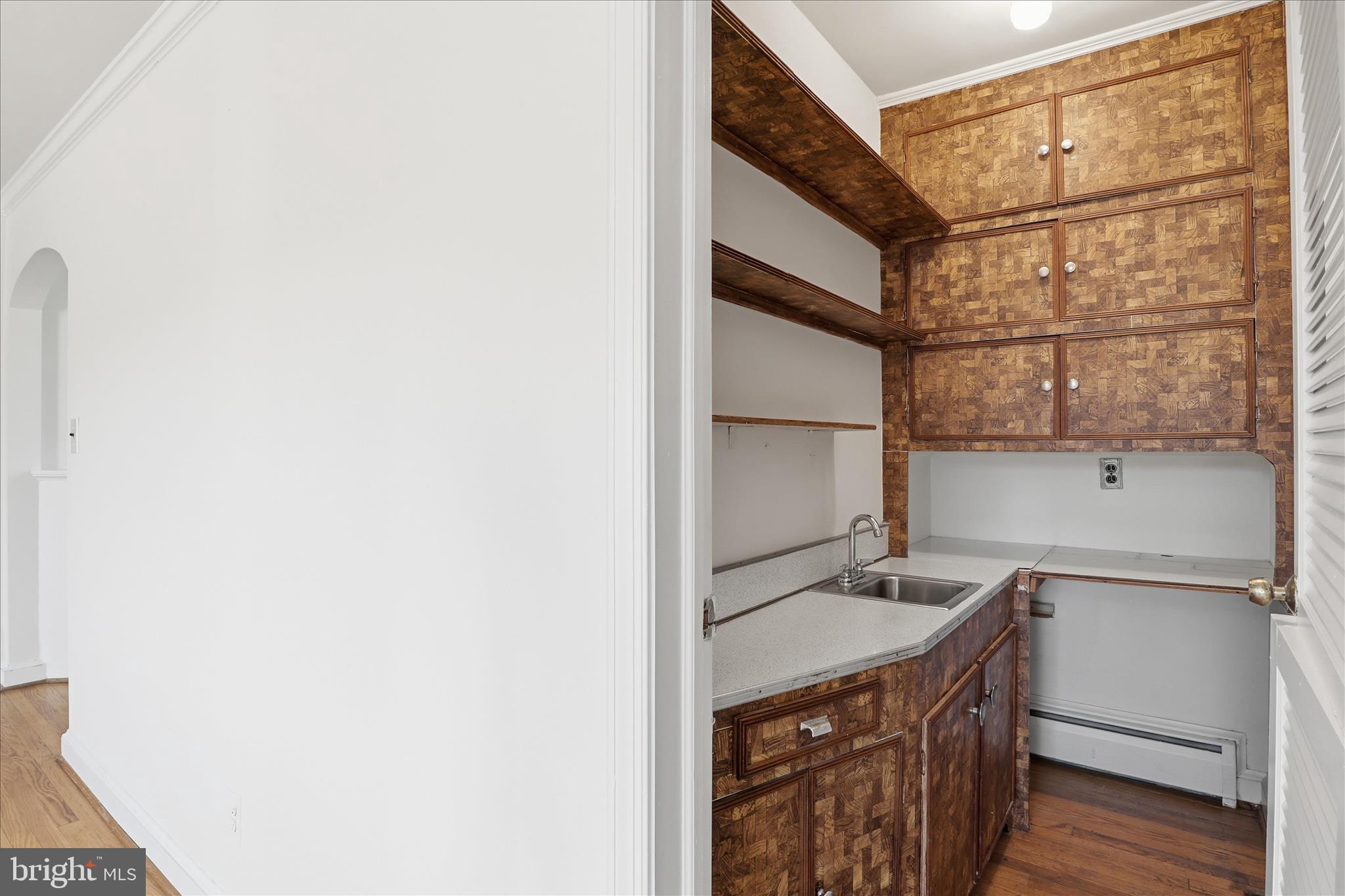 3701 Pine Brook Road Alexandria, VA 22310 - Photo 19 of 78 a bathroom with a sink and a mirror