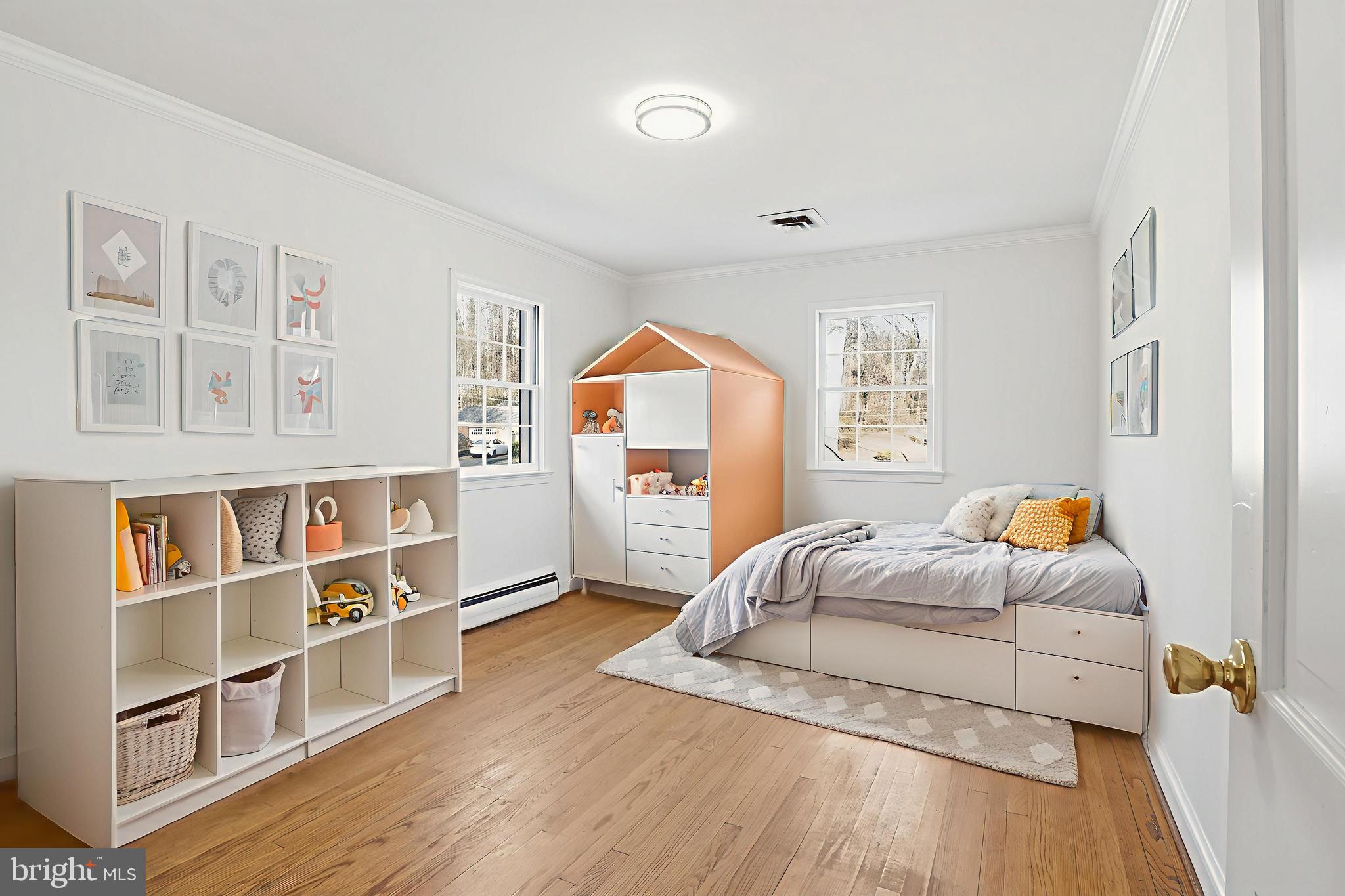 3701 Pine Brook Road Alexandria, VA 22310 - Photo 24 of 78 a bedroom with furniture and a book shelf