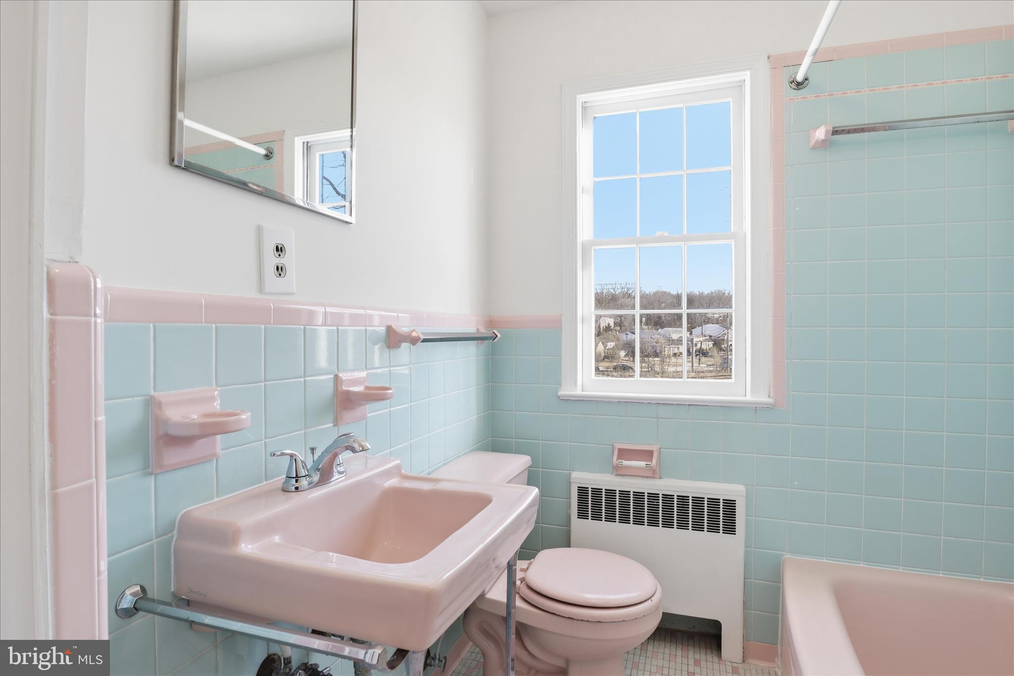 3701 Pine Brook Road Alexandria, VA 22310 - Photo 31 of 78 a bathroom with a sink toilet and mirror
