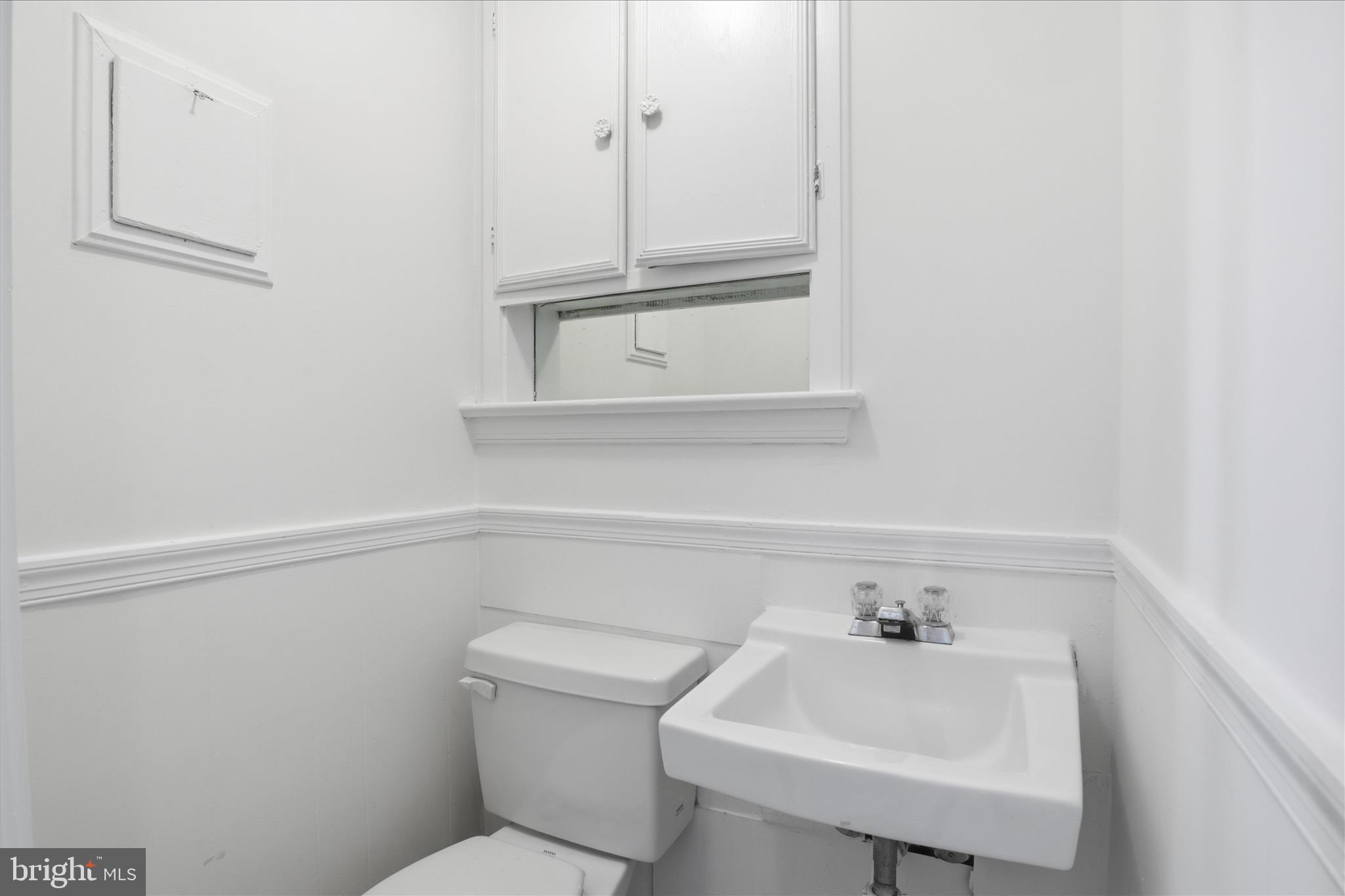 3701 Pine Brook Road Alexandria, VA 22310 - Photo 46 of 78 a bathroom with a sink and a toilet