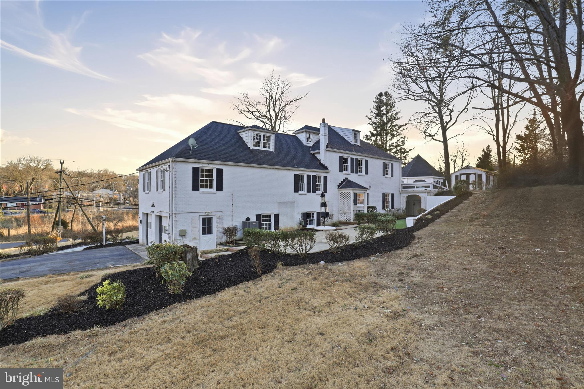 3701 Pine Brook Road Alexandria, VA 22310 - Photo 56 of 78 a front view of a house with a garden