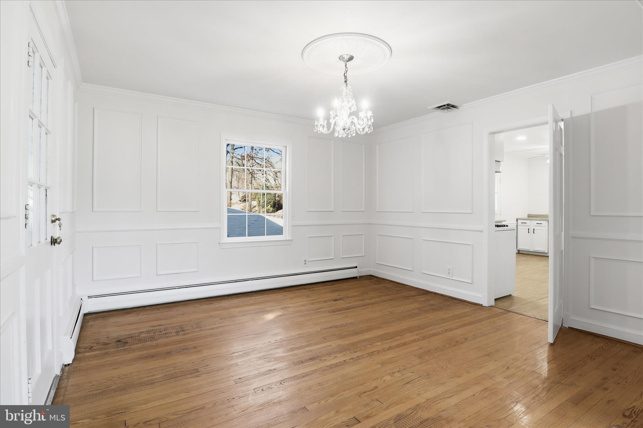 3701 Pine Brook Road Alexandria, VA 22310 - Photo 9 of 78 an empty room with wooden floor