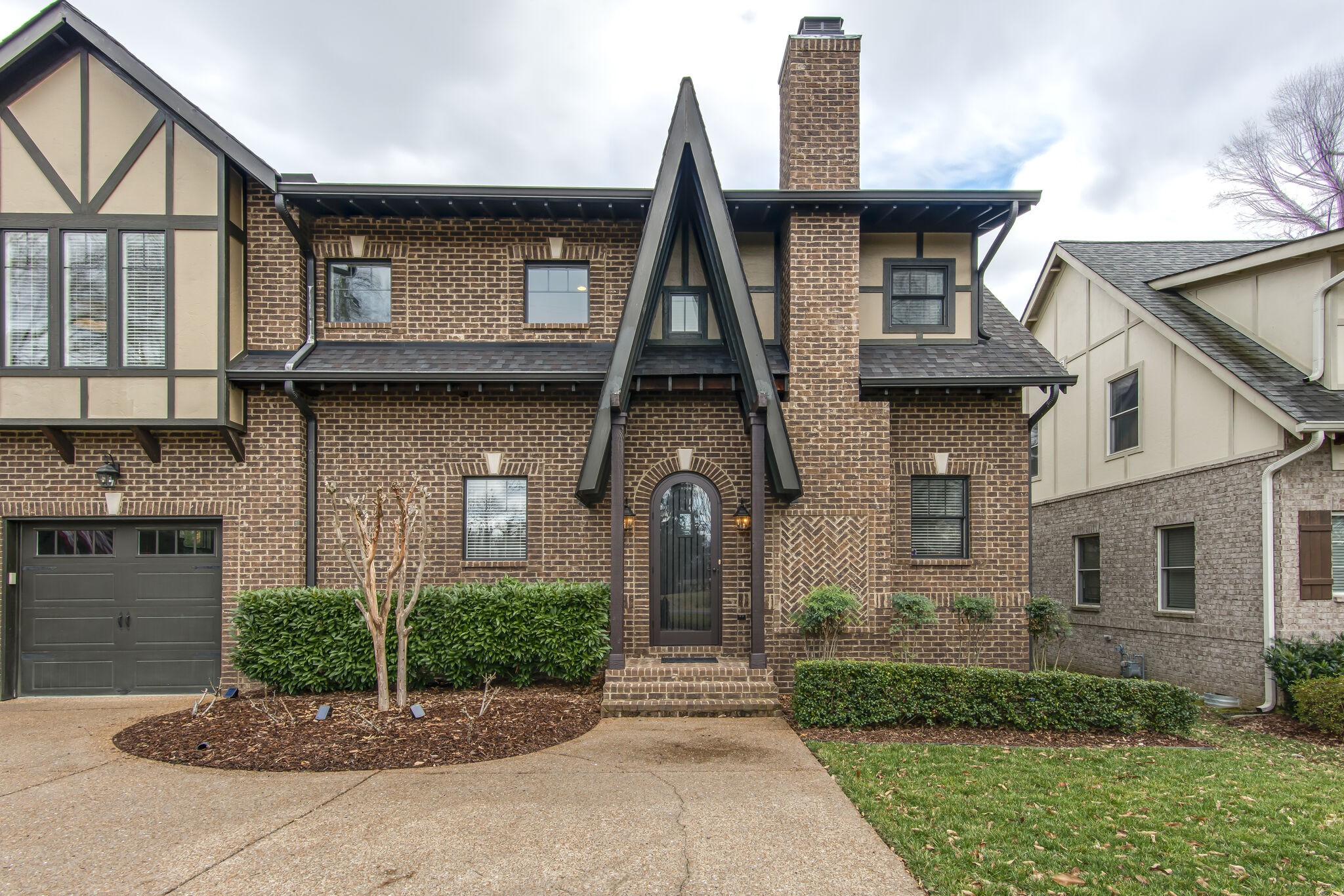 706 Crescent Road Nashville, TN 37205 - Photo 1 of 27 a front view of a house with garden