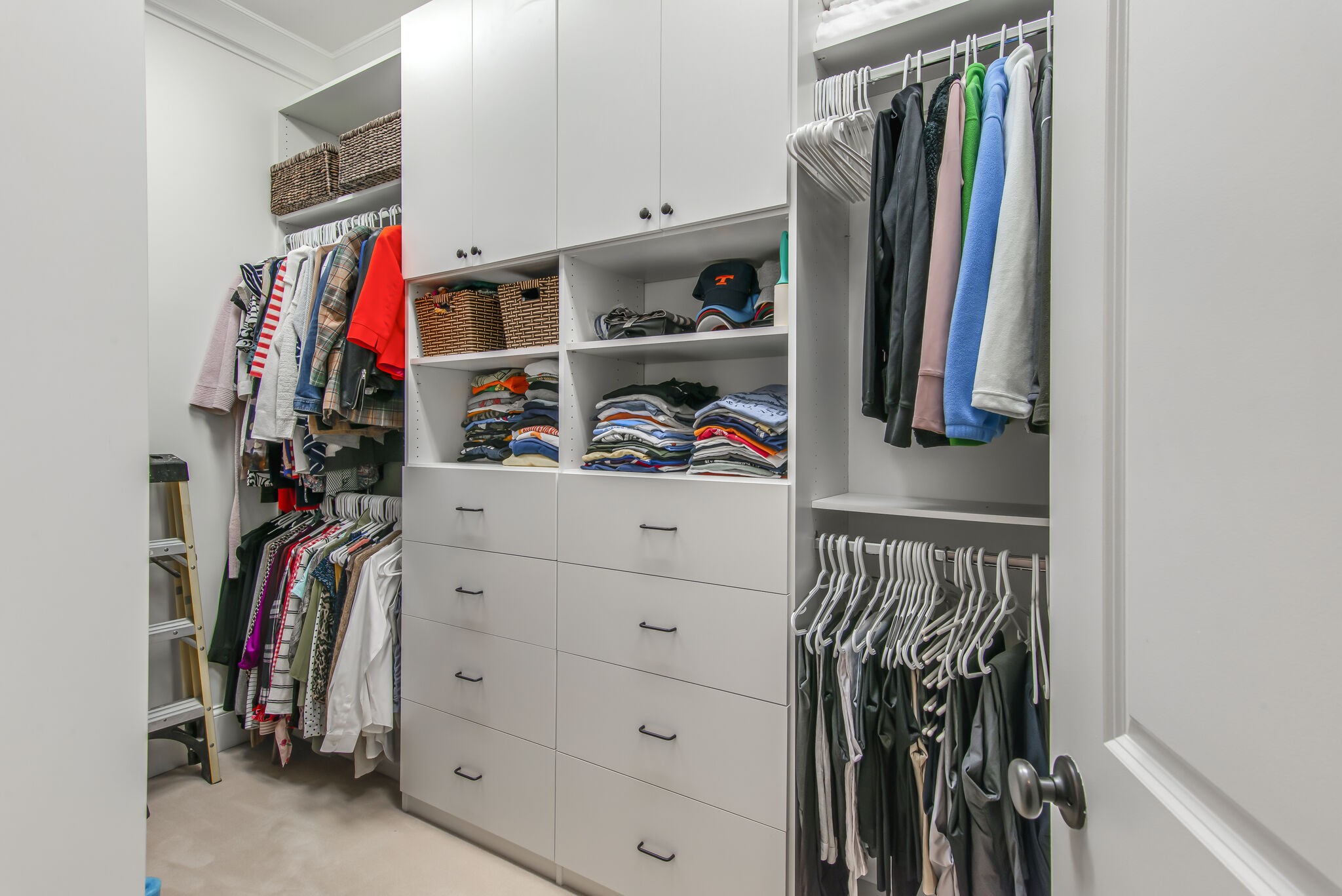 706 Crescent Road Nashville, TN 37205 - Photo 11 of 27 a view of walk in closet with clothes and shoes