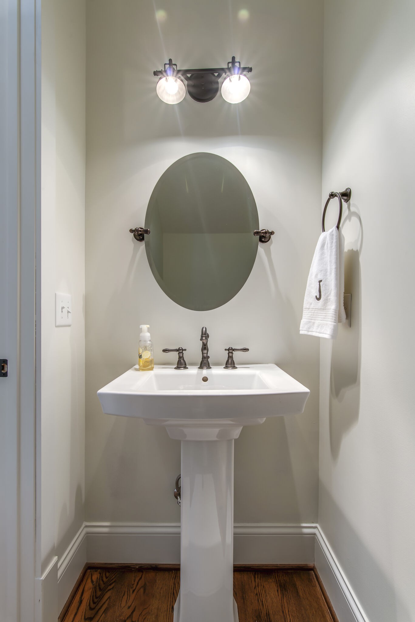 706 Crescent Road Nashville, TN 37205 - Photo 16 of 27 a bathroom with a sink and mirror