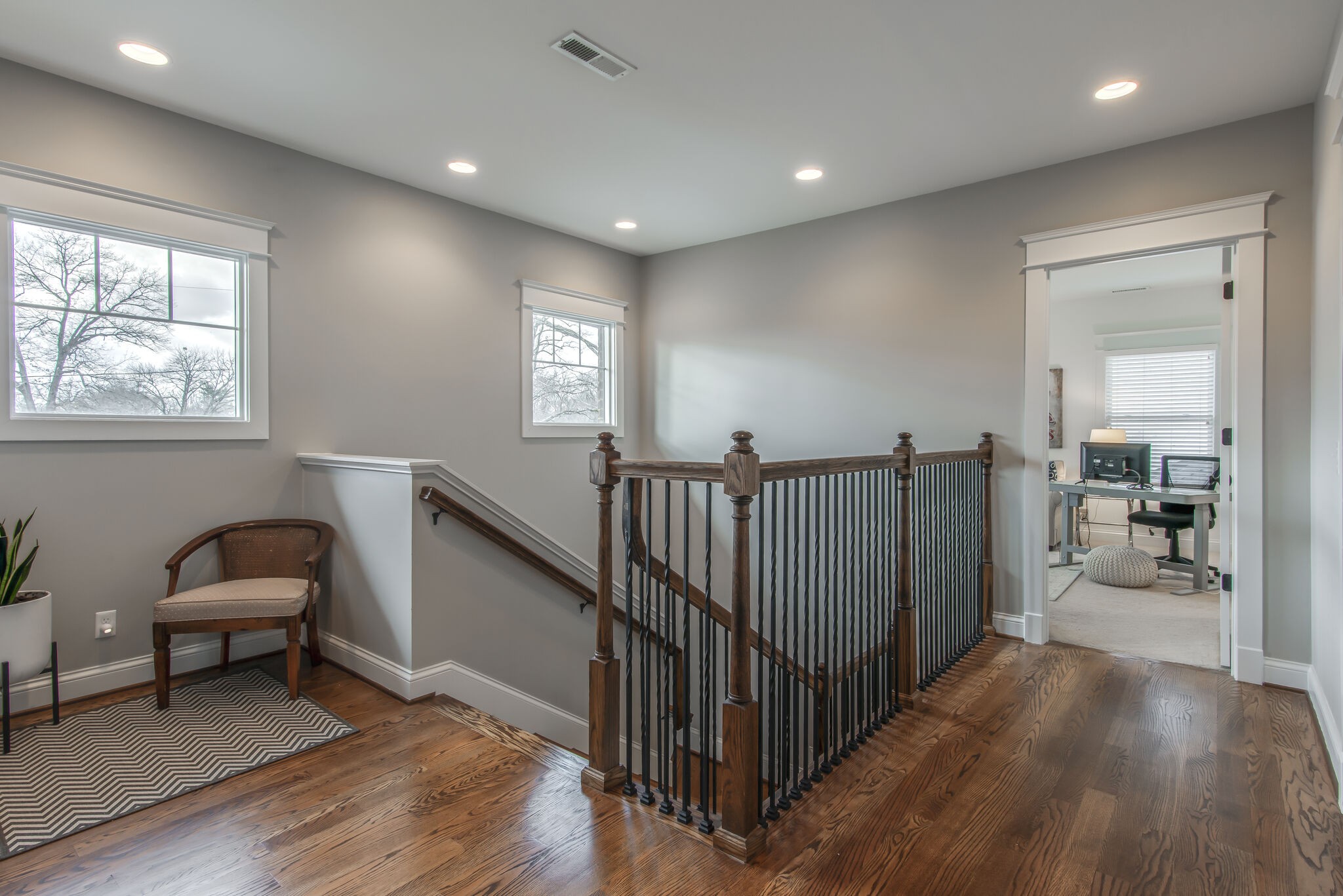 706 Crescent Road Nashville, TN 37205 - Photo 17 of 27 a view of a hallway with workspace and a window