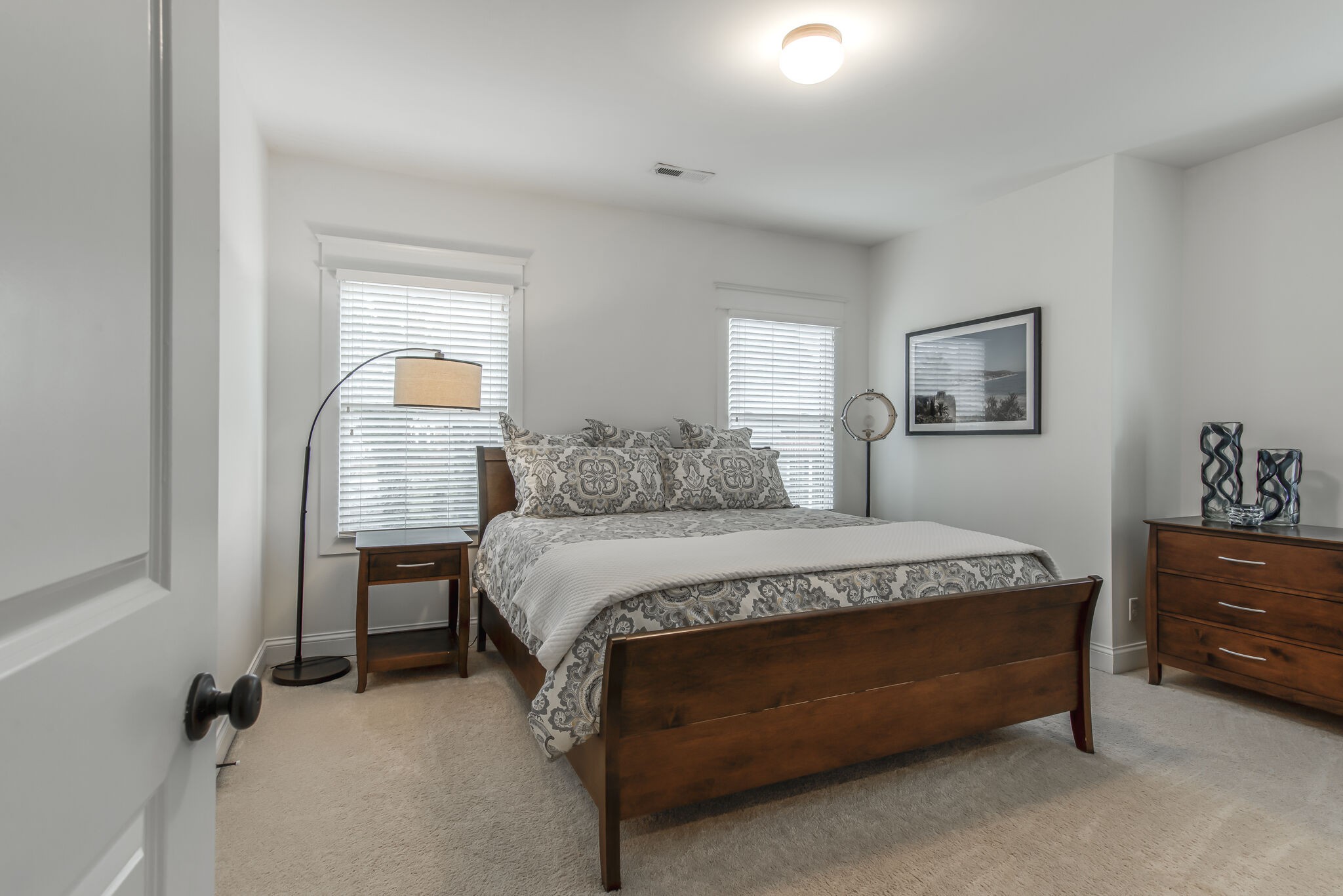 706 Crescent Road Nashville, TN 37205 - Photo 22 of 27 a spacious bedroom with a bed chair and window