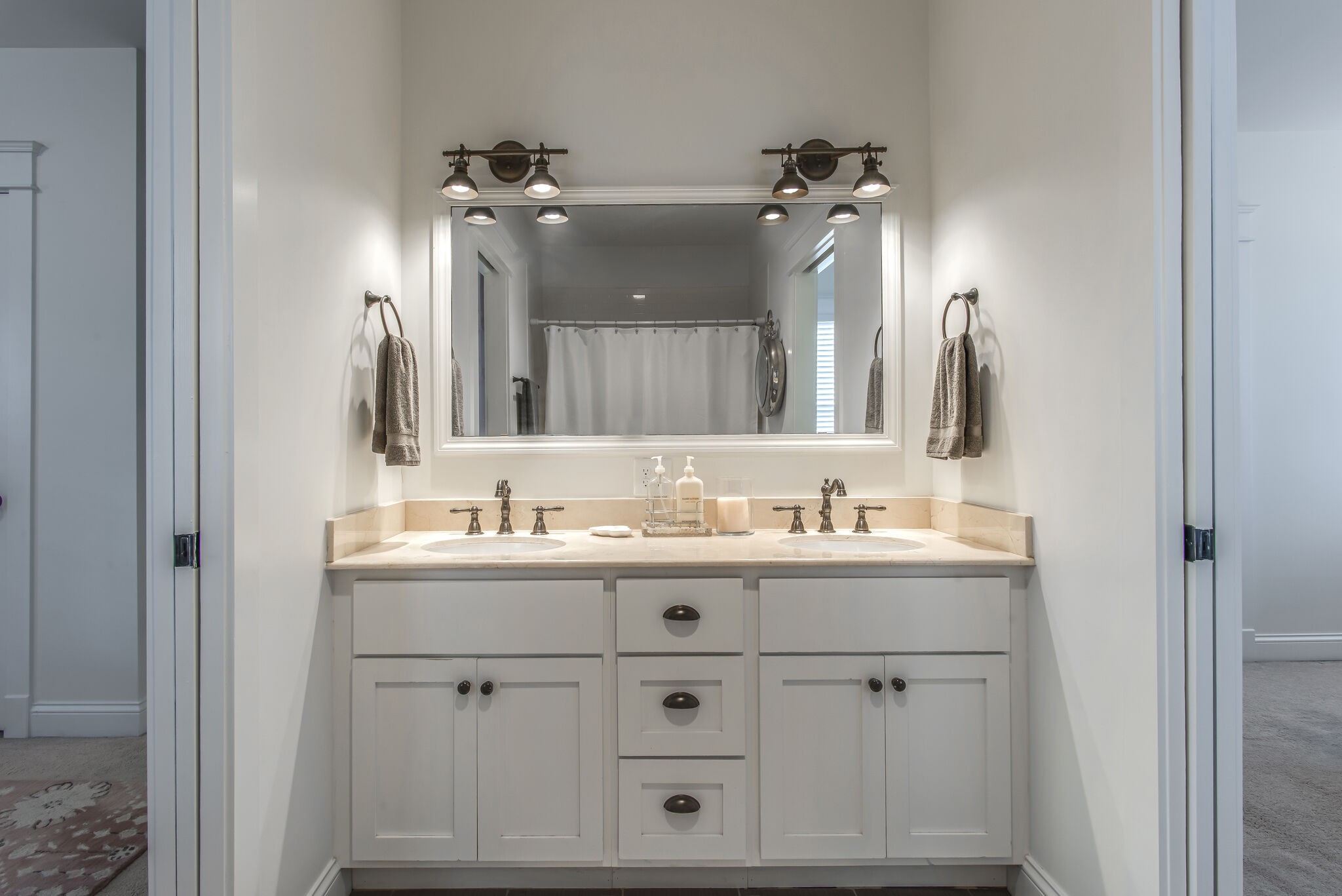 706 Crescent Road Nashville, TN 37205 - Photo 24 of 27 a bathroom with a double vanity sink and mirror