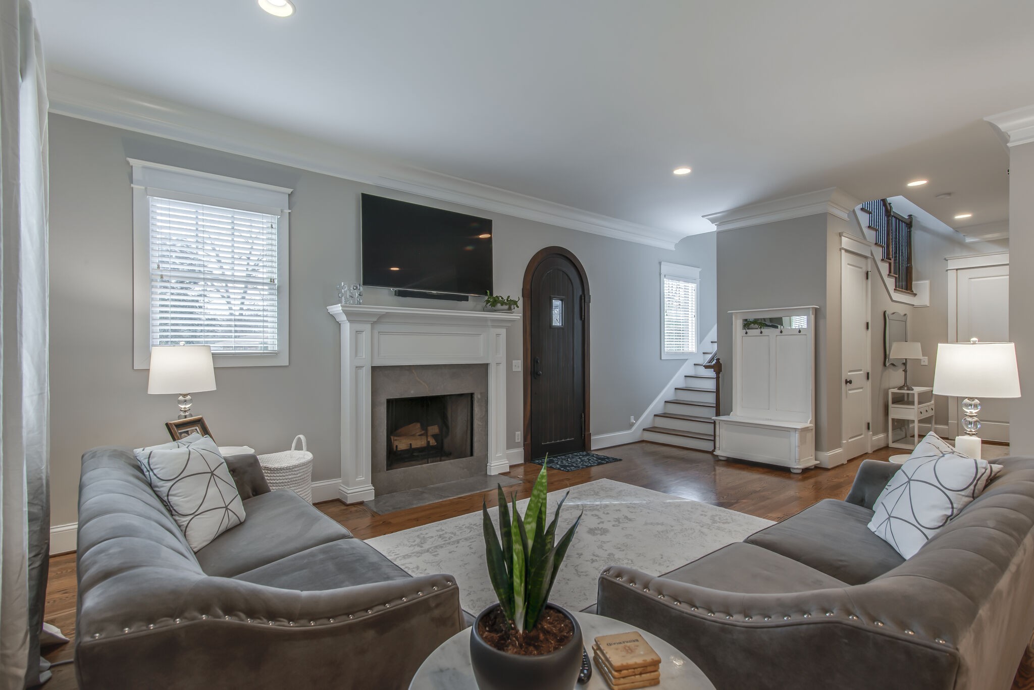 706 Crescent Road Nashville, TN 37205 - Photo 5 of 27 a living room with furniture a fireplace and a flat screen tv
