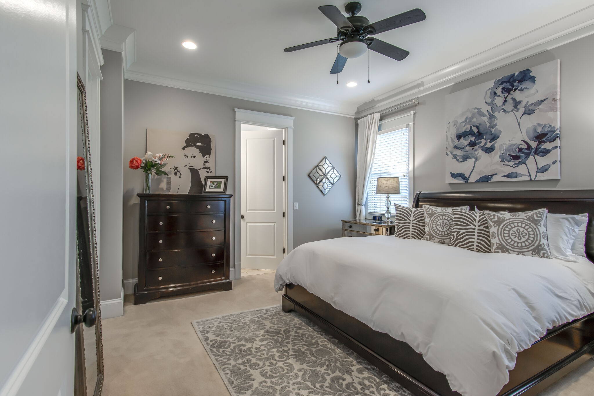 706 Crescent Road Nashville, TN 37205 - Photo 9 of 27 a bedroom with a bed and a painting on the wall