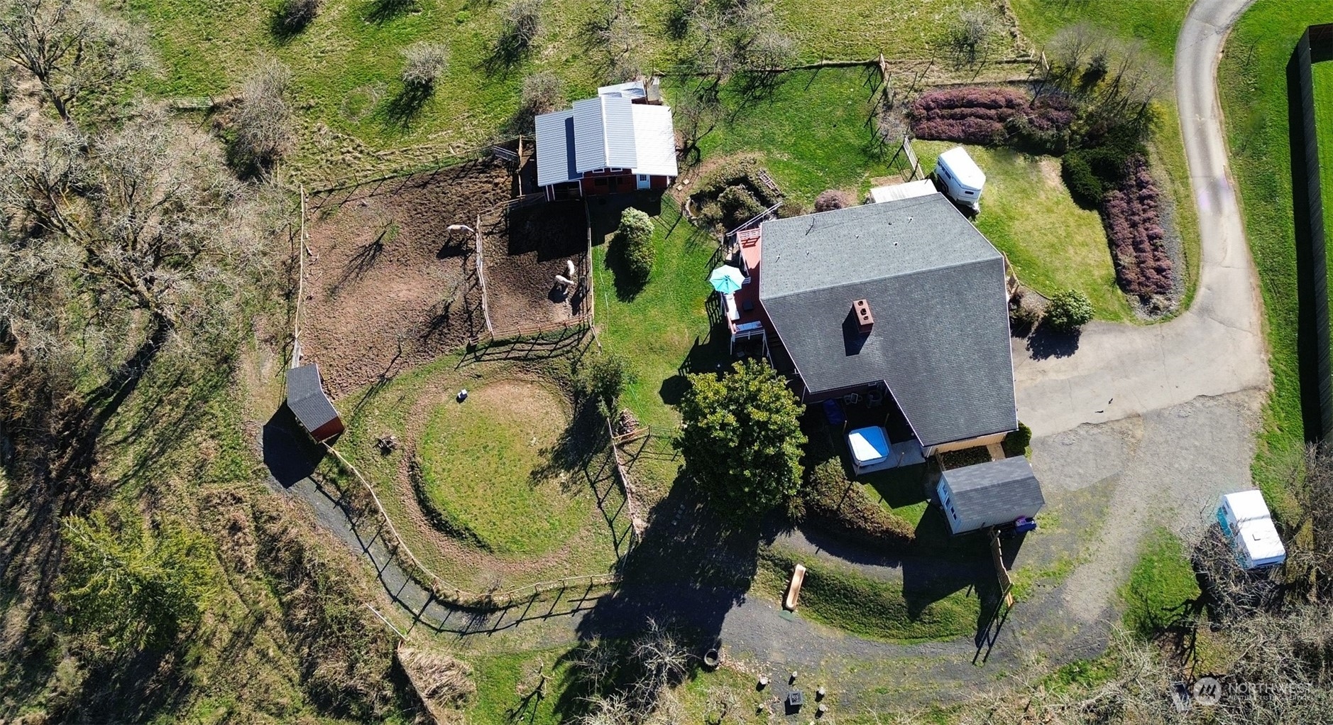 1053 Shorey Road Chehalis, WA 98532 - Photo 4 of 39 an aerial view of a house with a swimming pool